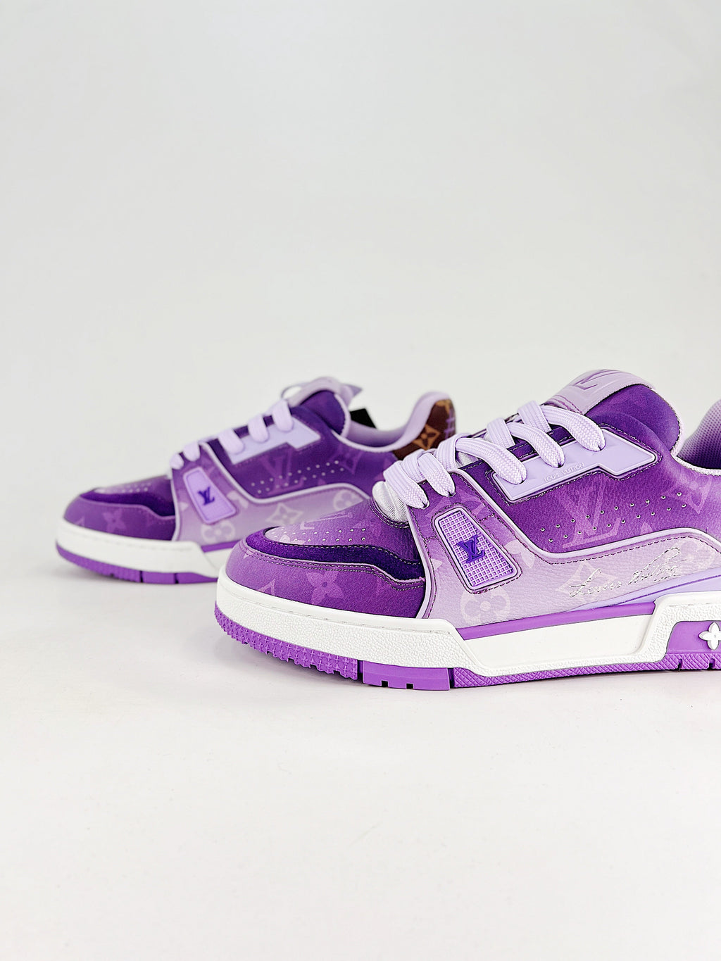 LV Trainer #54 Purple Monogram - Three quarter side pair view