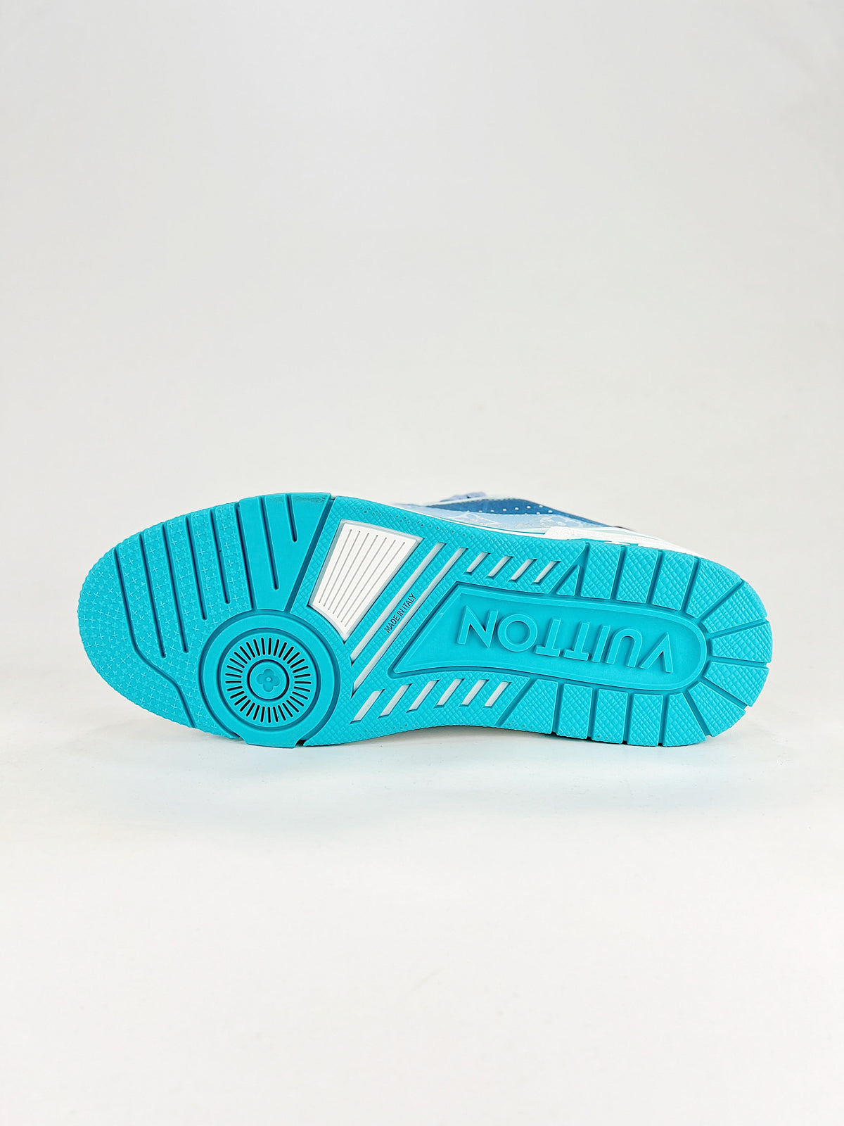 LV Trainer #54 Blue Monogram - Heel view