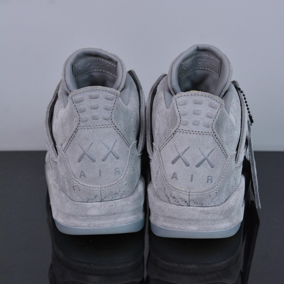 KAWS x Air Jordan 4 Cool Grey - outsole view showing Companion graphics