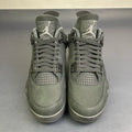 Air Jordan 4 Black Cat - front toe box pair view showing Flight tongue and mesh panels