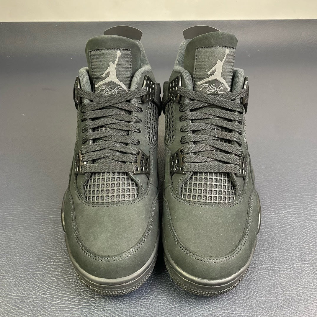 Air Jordan 4 Black Cat - front toe box pair view showing Flight tongue and mesh panels