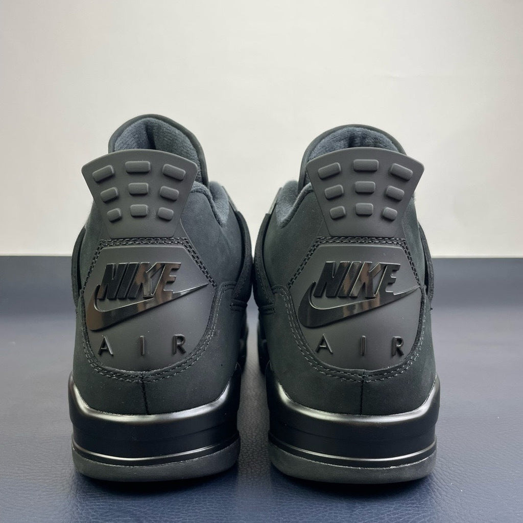 Air Jordan 4 Black Cat - heel pair view showing tonal Nike Air debossed logo