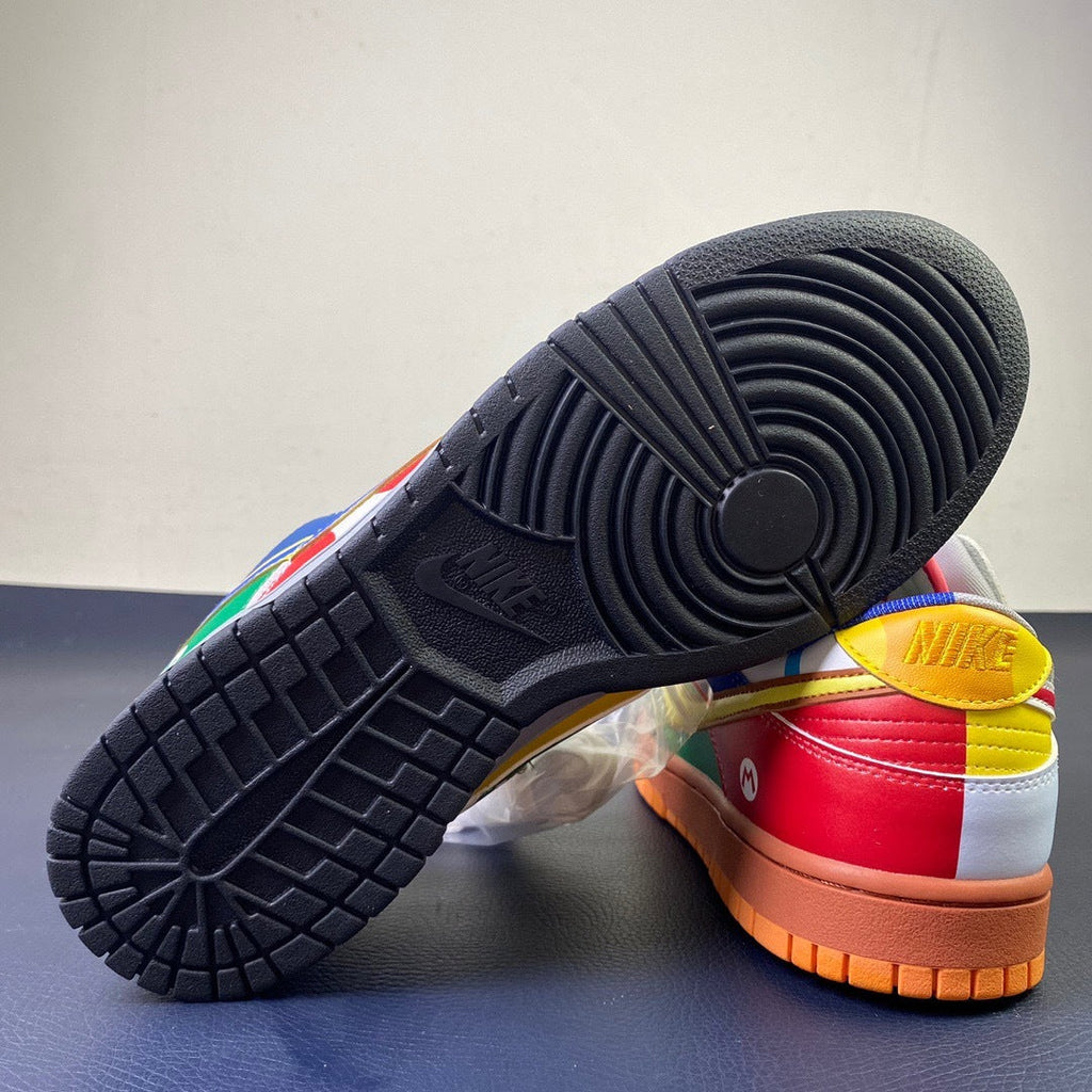 Nike Dunk Low What The Mario - outsole view showing mismatched black and orange gum soles