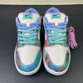 Nike SB Dunk Low Futura Laboratories - toe view pair showing teal NIKE SB tongue label and multicolor canvas