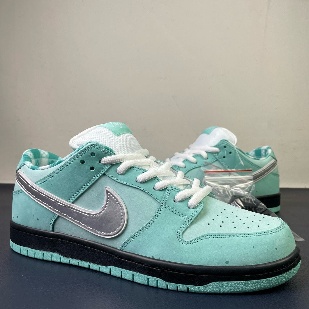 Nike SB Dunk Low x Tagz Teal - Heel view