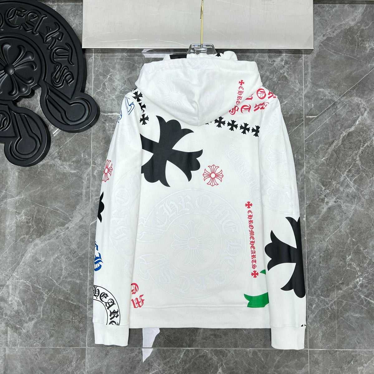 Chrome Hearts black all-over print hoodie full front view on hanger