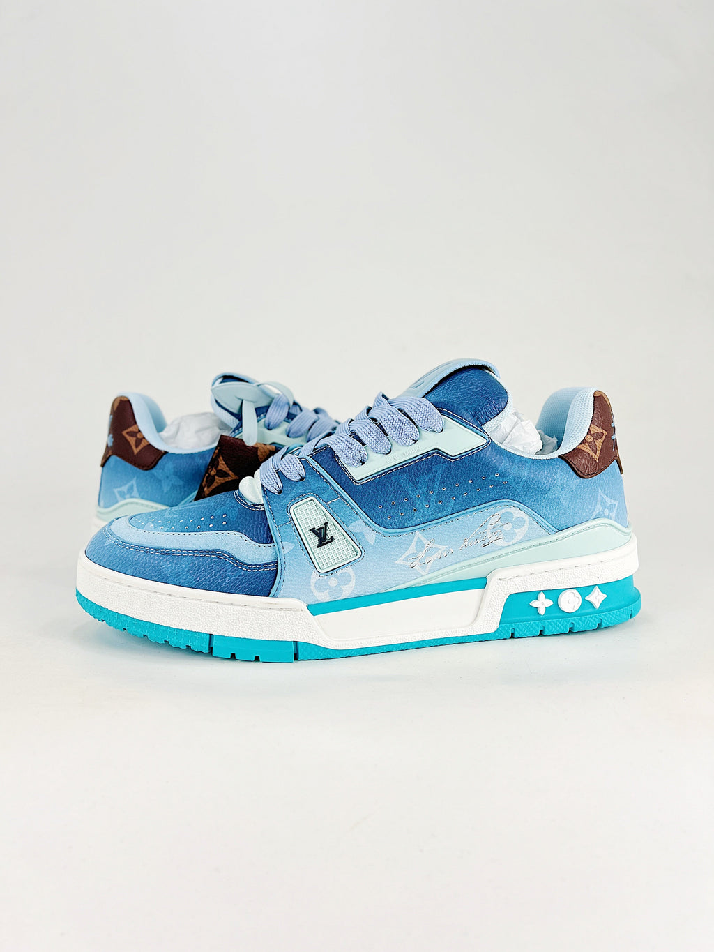 LV Trainer #54 Blue Monogram - Pair front angle