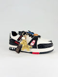 LV Trainer #54 Black White CNY – heel view showing red LV logo