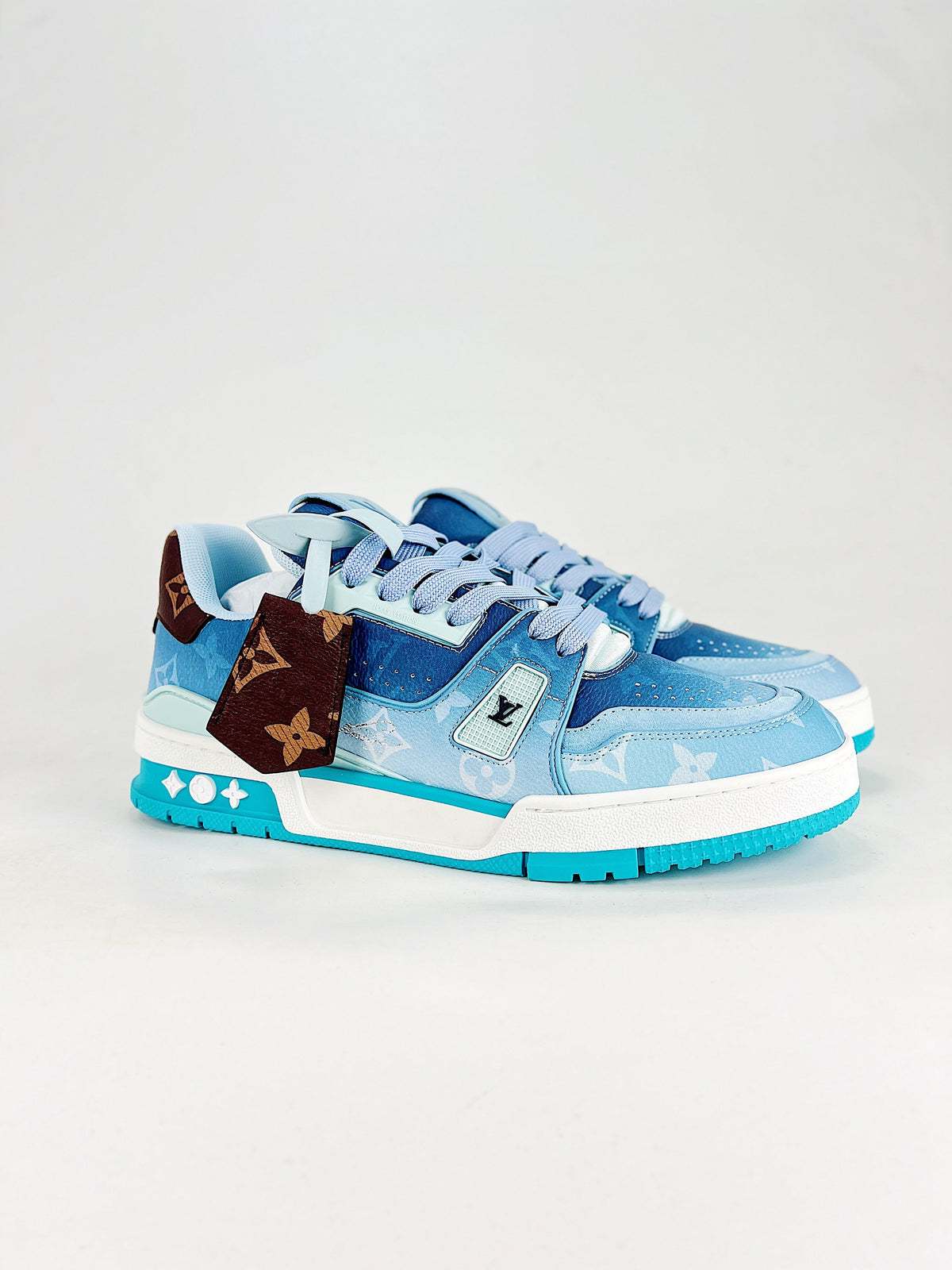 LV Trainer #54 Blue Monogram - Three quarter view