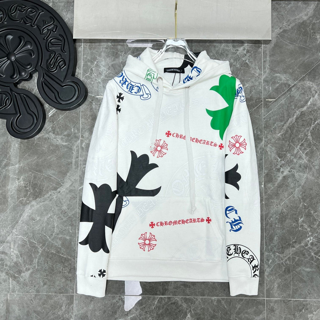 Chrome Hearts black hoodie close up detail showing red gothic Chromehearts script and floral cross