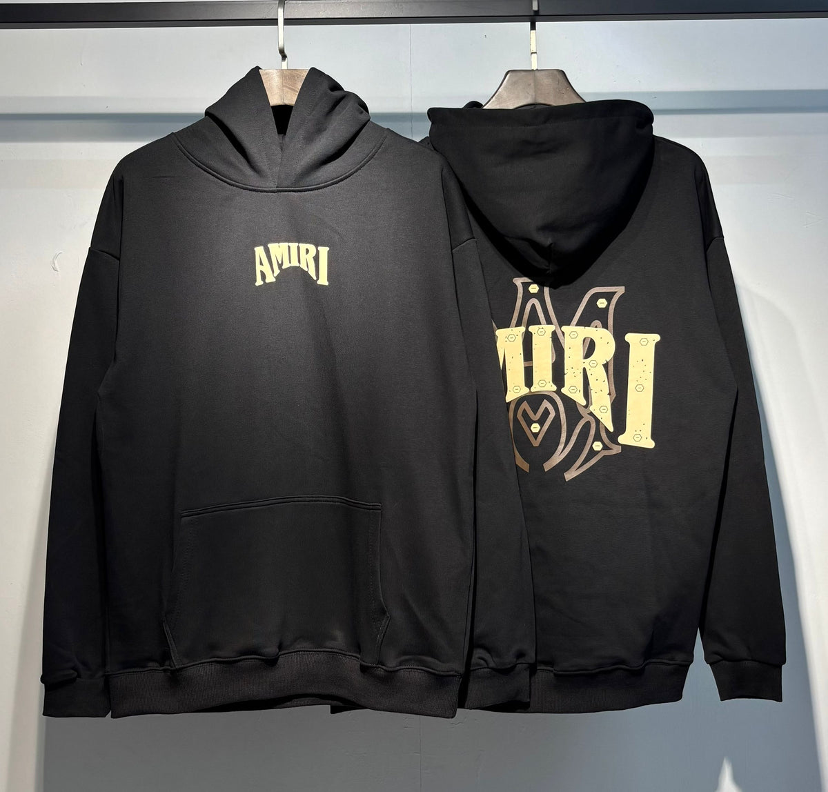 Amiri MA Logo Hoodie Black Gold – front and back view