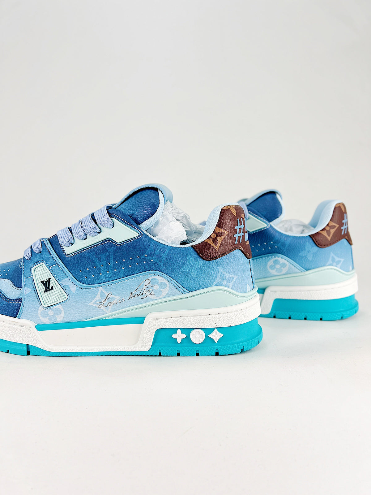 LV Trainer #54 Blue Monogram - Pair side view
