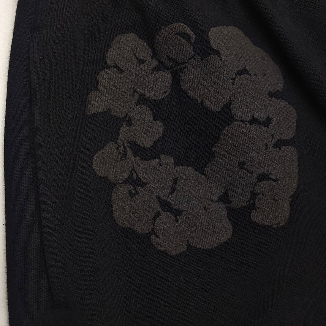 Denim Tears Cotton Wreath Sweatpants Black - Front