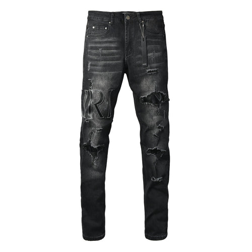 AMIRI Black Distressed Denim Jeans - Front View