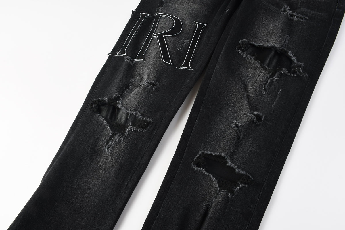 AMIRI Black Distressed Denim Jeans - Leather Underlay Detail
