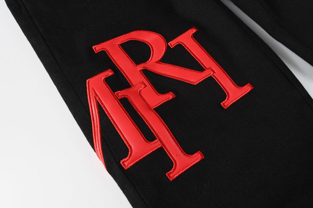 Amiri MA Logo Jeans Black Red – Front view