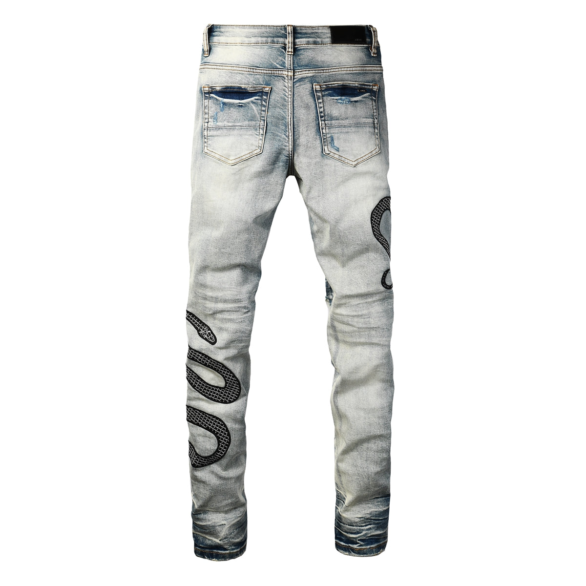 Snake embroidered distressed jeans back view