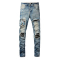 Amiri Dragon Patch Distressed Jeans – leather insert detail
