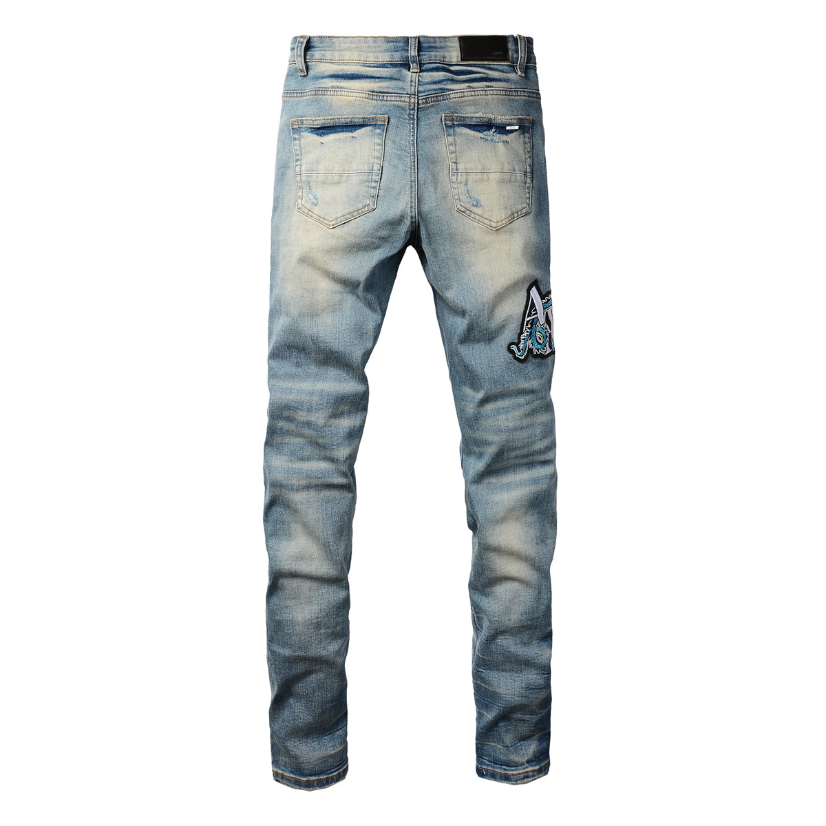 Amiri Dragon Patch Distressed Jeans – front view