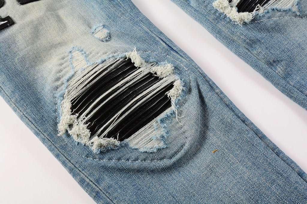 Amiri Dragon Patch Distressed Jeans – front and back view