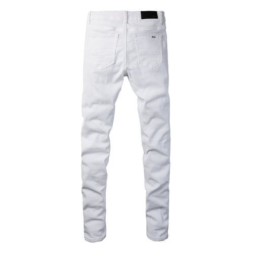 Amiri white distressed jeans - front and back view