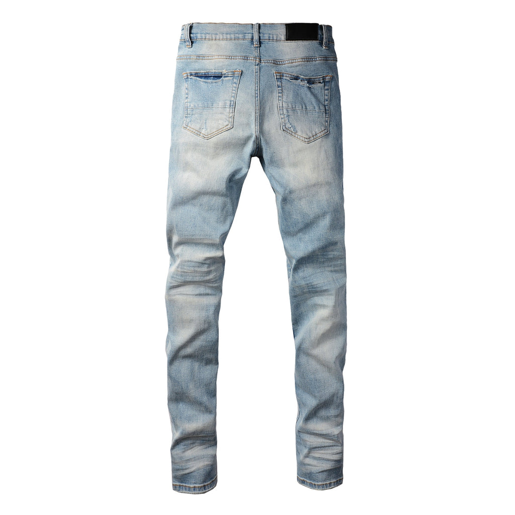 Amiri MA Logo Distressed Jeans – Front and Back View