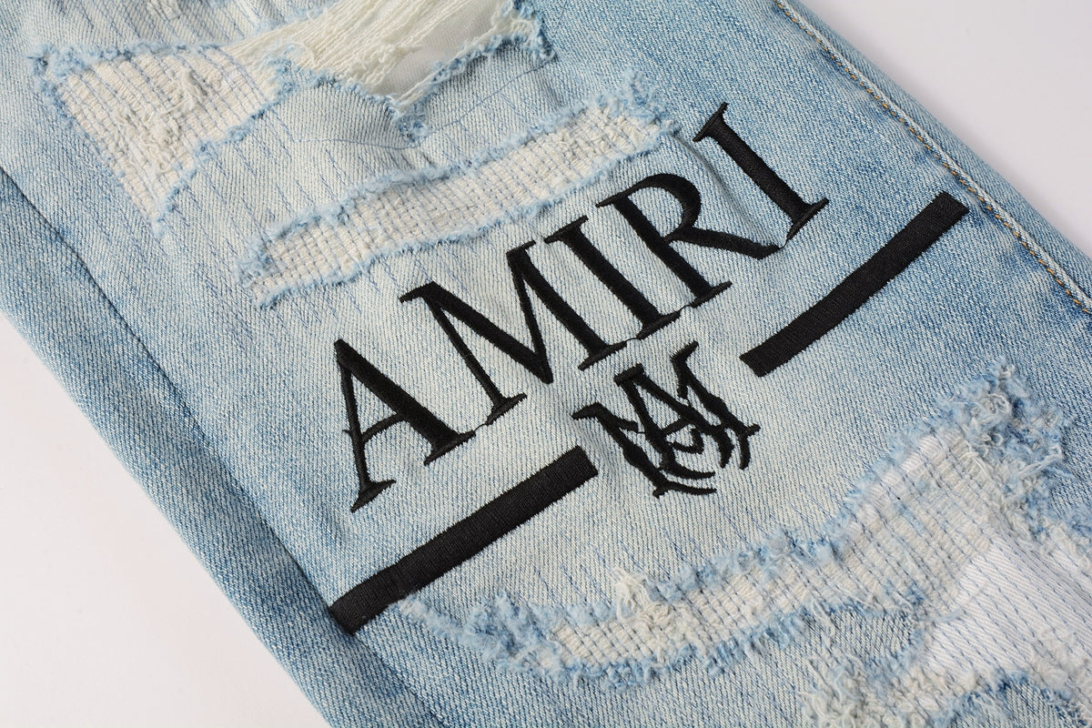 Amiri MA Logo Distressed Jeans Light Blue – Front View