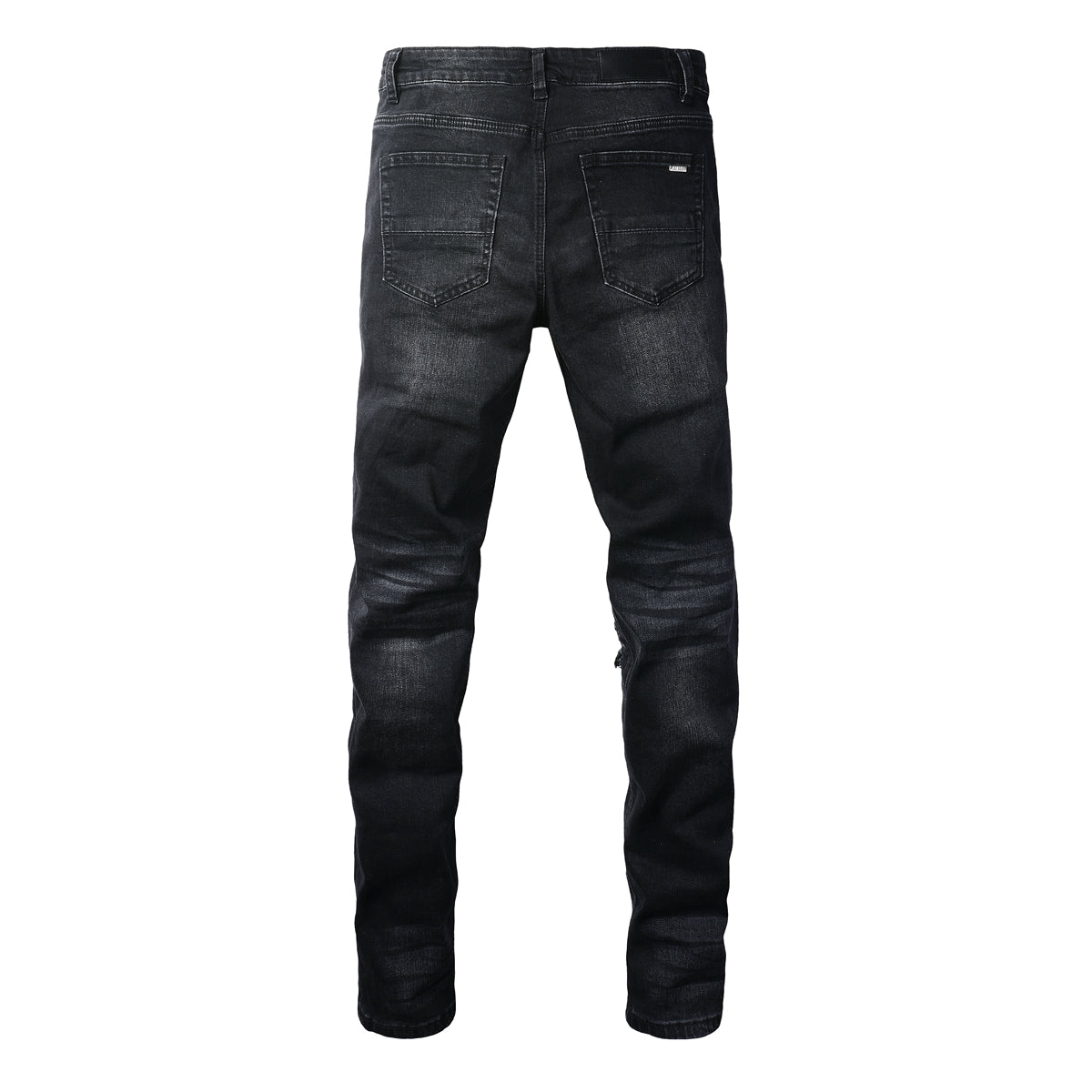 AMIRI black distressed jeans front close-up