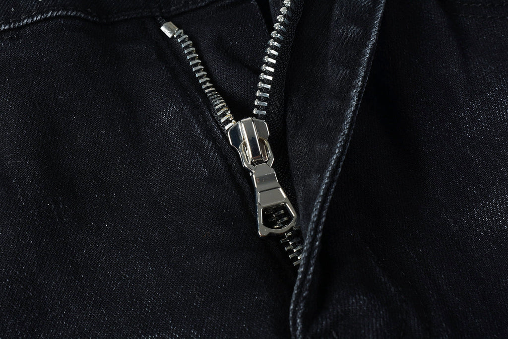 AMIRI black distressed jeans back view