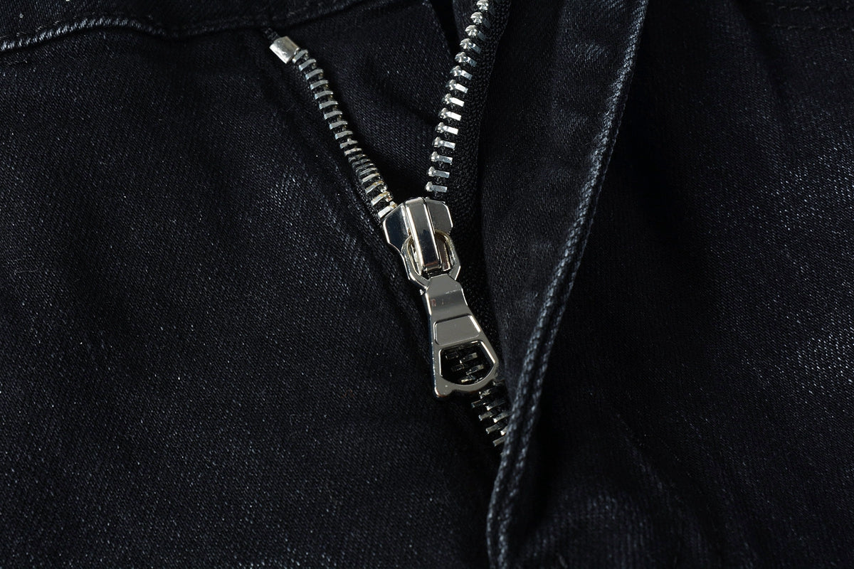 AMIRI black distressed jeans back view