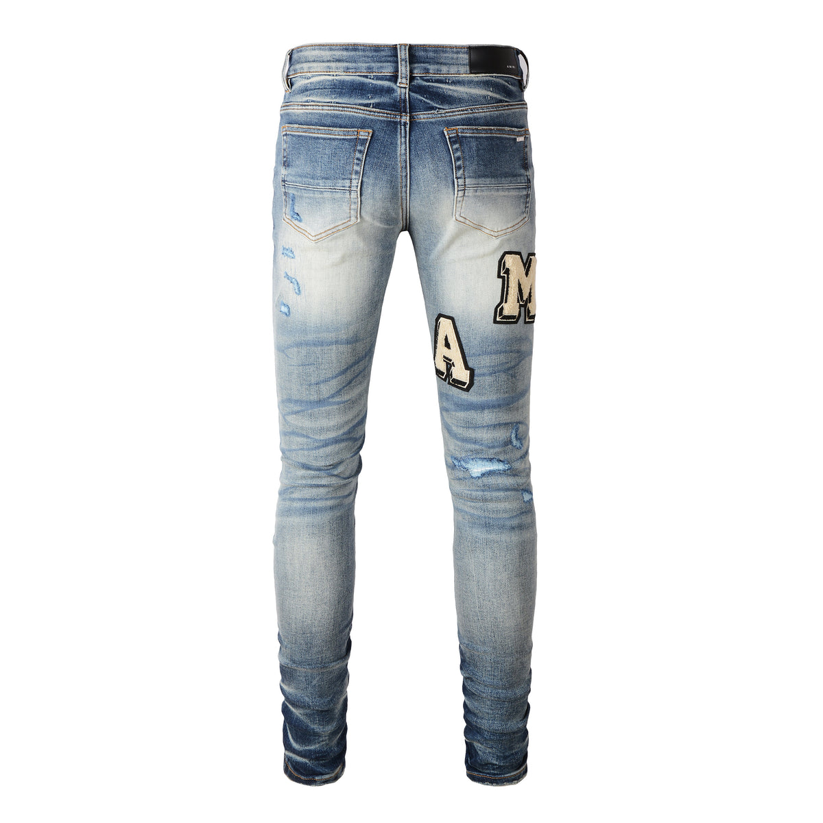 AMIRI MA Varsity Jeans distressing detail close-up