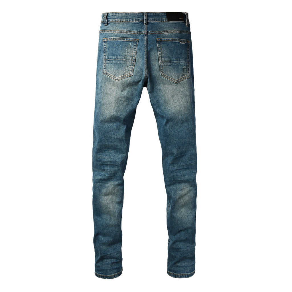 AMIRI MX1 Blue Leather Patch Jeans - Front view