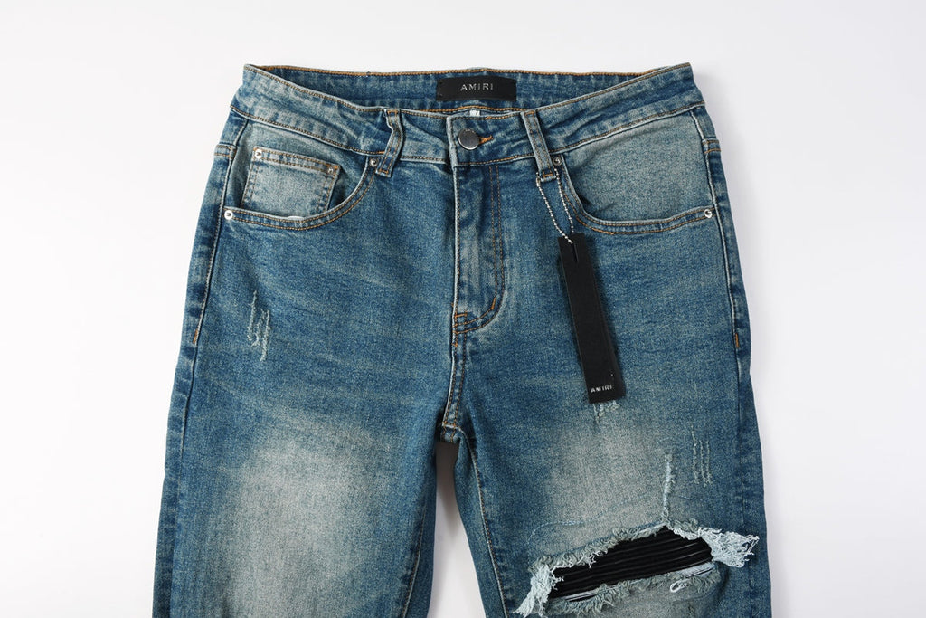 AMIRI MX1 Blue Leather Patch Jeans - Knee leather patch detail