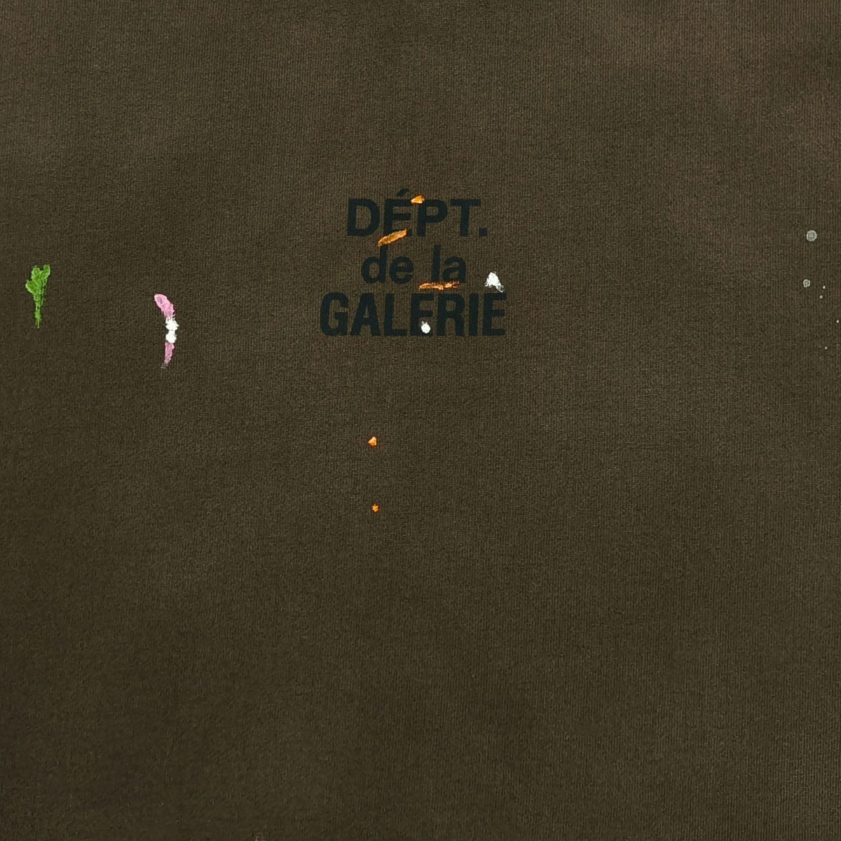 Gallery Dept. Dépt. de la Galerie chest logo detail with paint splatter
