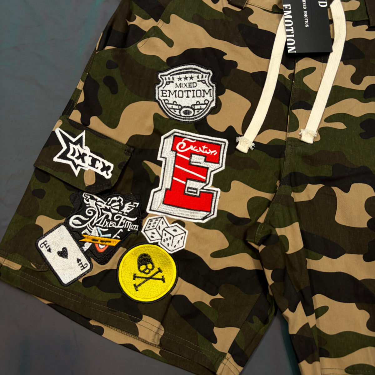 Mixed Emotion Camo Patch Cargo Shorts - back flat lay