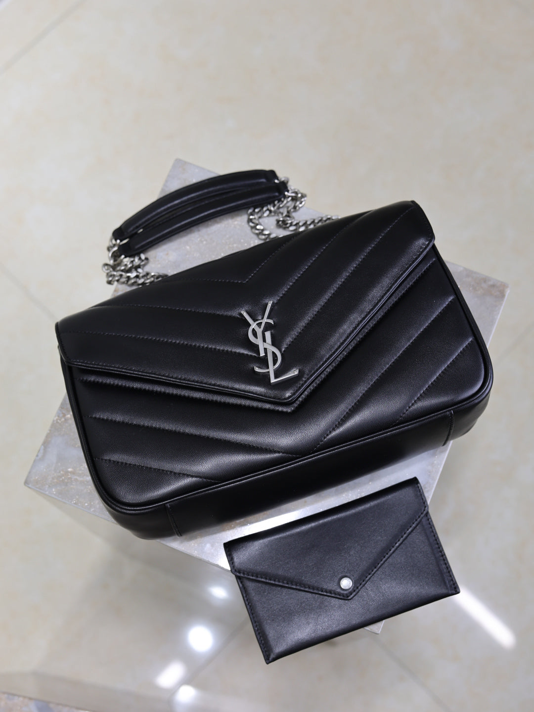 Saint Laurent Loulou bag back view with chain strap and card holder