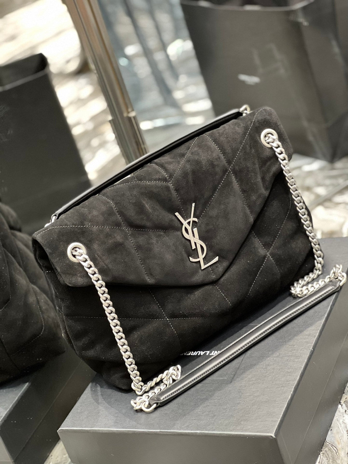 Saint Laurent Loulou Puffer bag side angle view in black suede