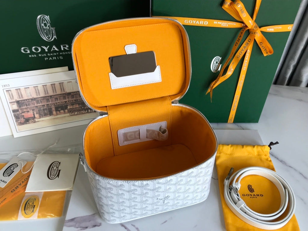 Goyard Vanity Case interior saffron yellow lining with built-in mirror and card slot
