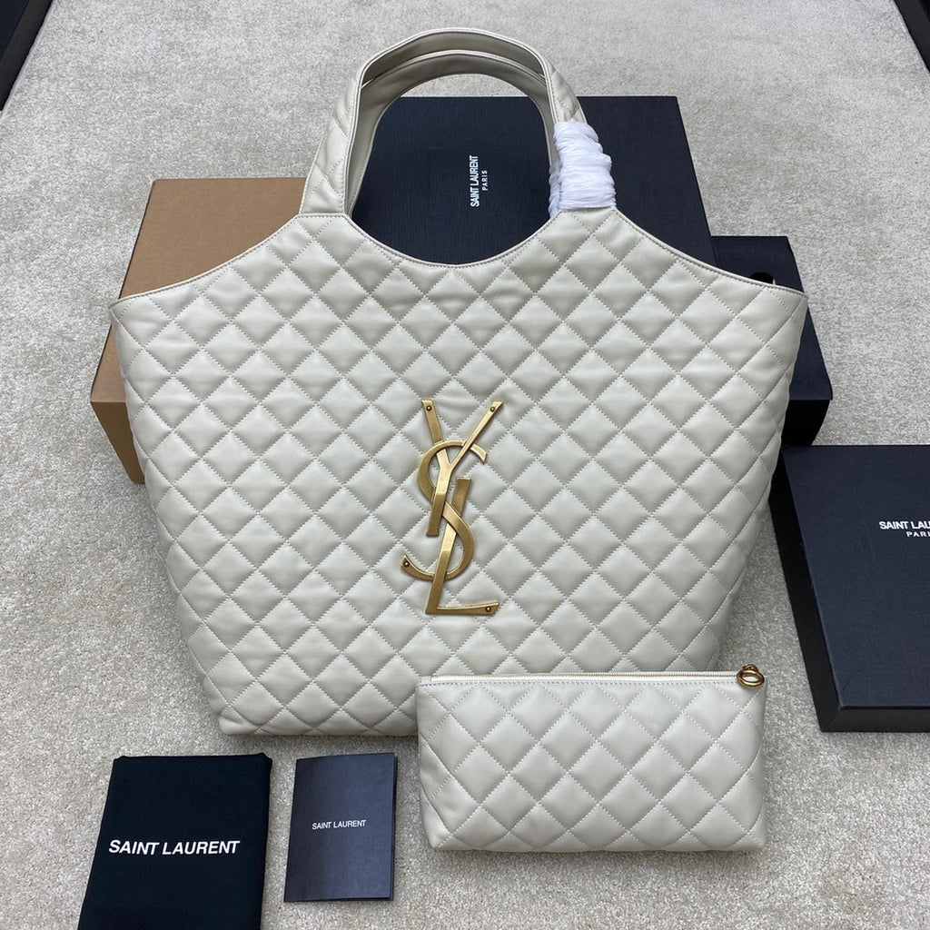 Saint Laurent Icare Maxi bag front view with oversized YSL gold hardware and matching pouch
