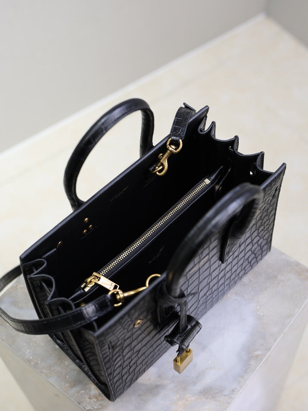 Saint Laurent Sac de Jour small black croc interior view with zip pocket and gold hardware