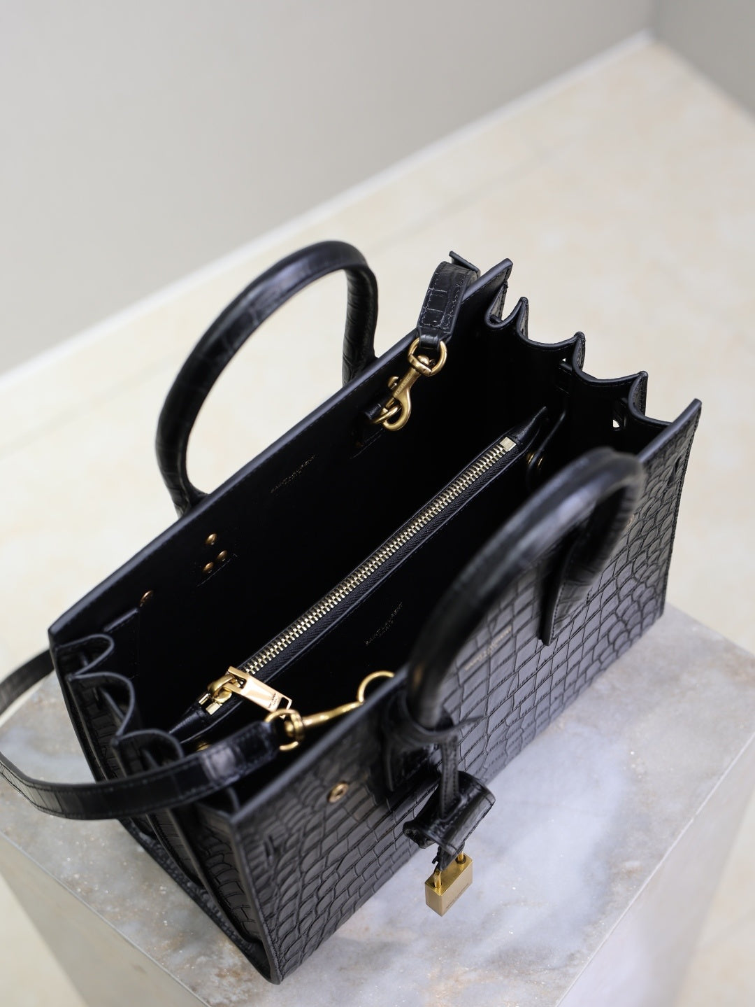 Saint Laurent Sac de Jour small black croc interior view with zip pocket and gold hardware