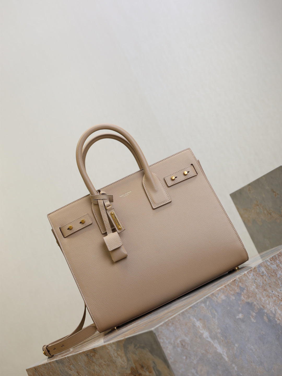 Saint Laurent Sac de Jour small bag side angle view with shoulder strap