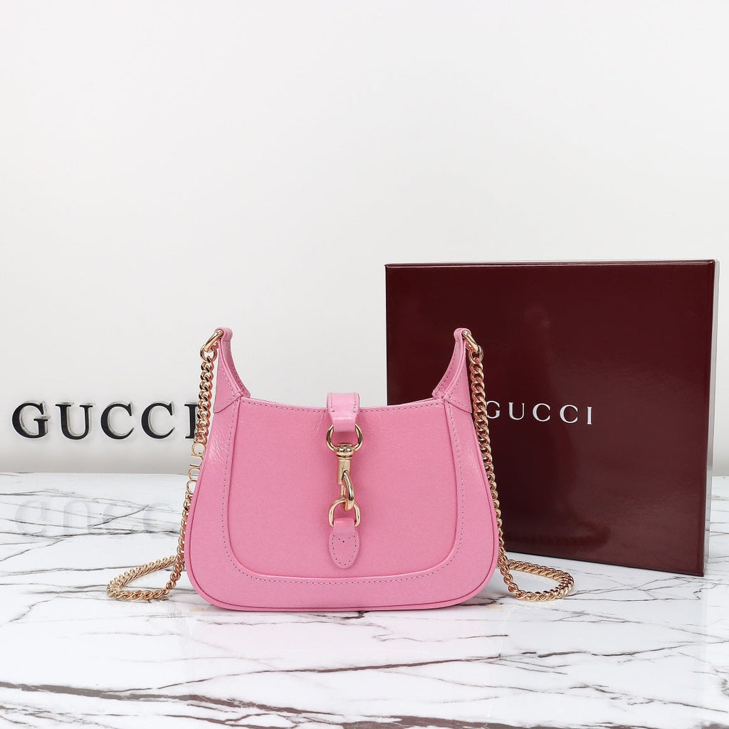Gucci Jackie 1961 mini bag front view with gold chain and Gucci box