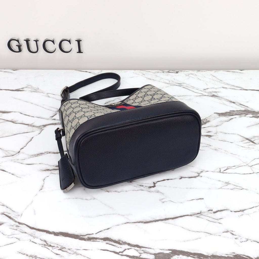 Gucci Ophidia bucket bag bottom view on marble
