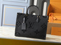 Louis Vuitton OnTheGo GM Black Empreinte – Front View with Luggage Tag