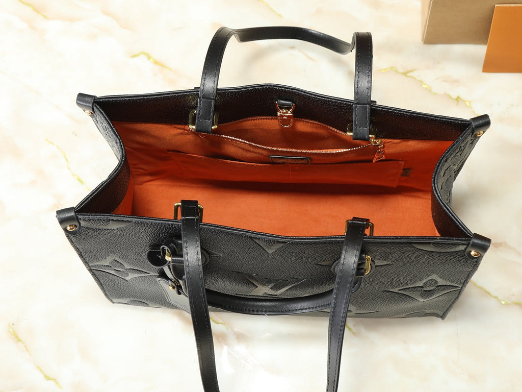 Louis Vuitton OnTheGo GM Black Empreinte – Burnt Orange Interior with Zip Pocket