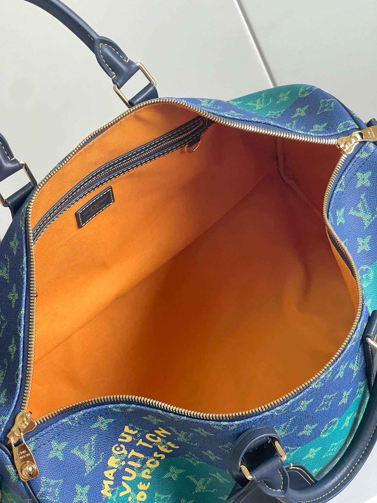 Louis Vuitton Keepall Bandoulière 50 – Orange Interior with Zip Pocket