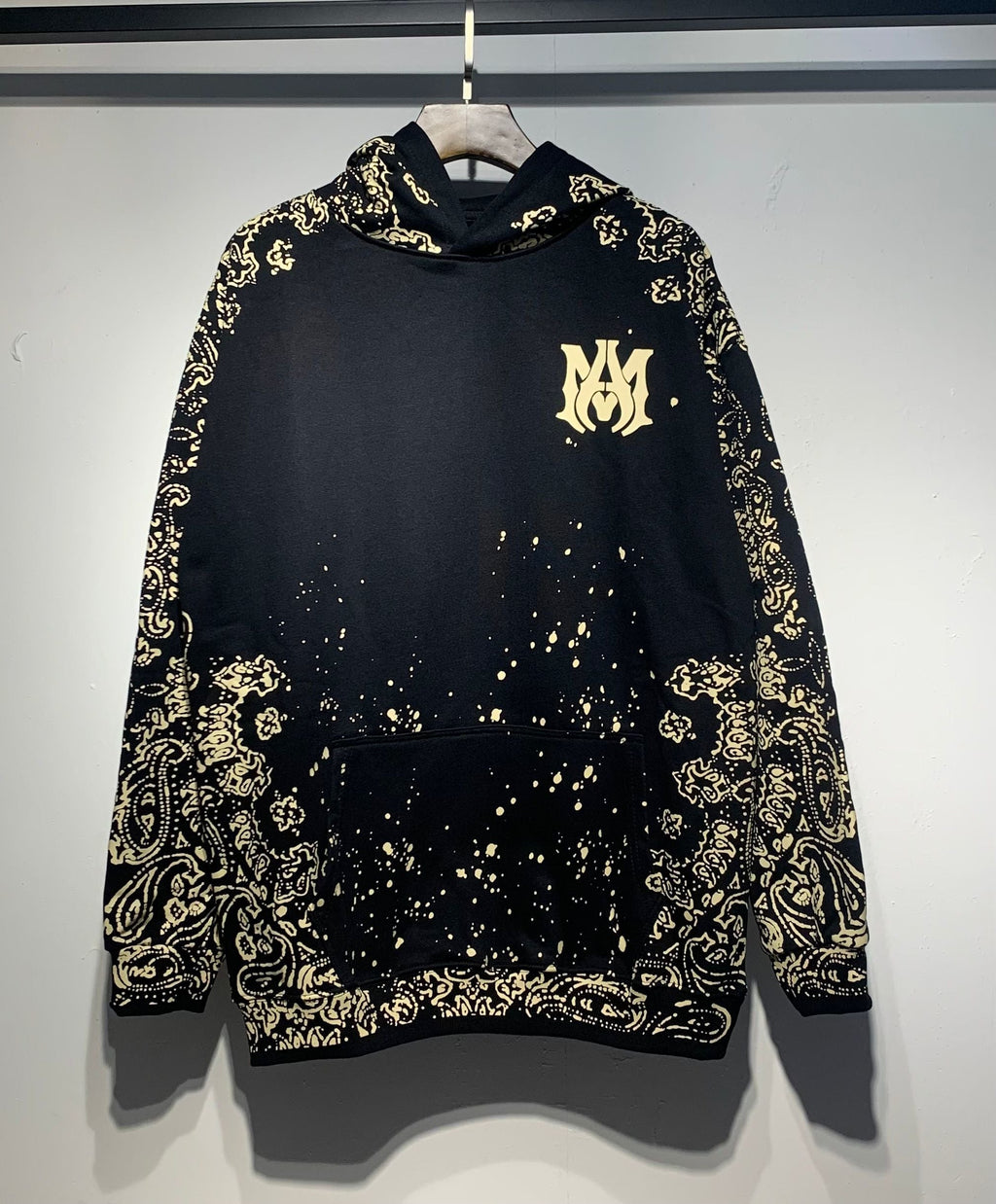 Amiri Paisley Bandana Hoodie – Black Gold front view solo with MA monogram