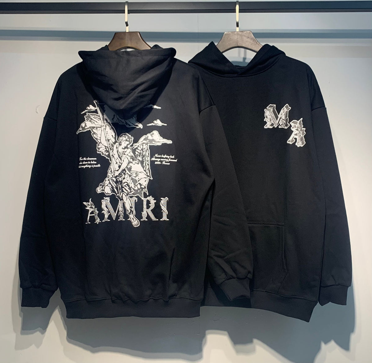 Amiri Angel Hoodie – Back view angel graphic with AMIRI wordmark and front MA monogram side by side