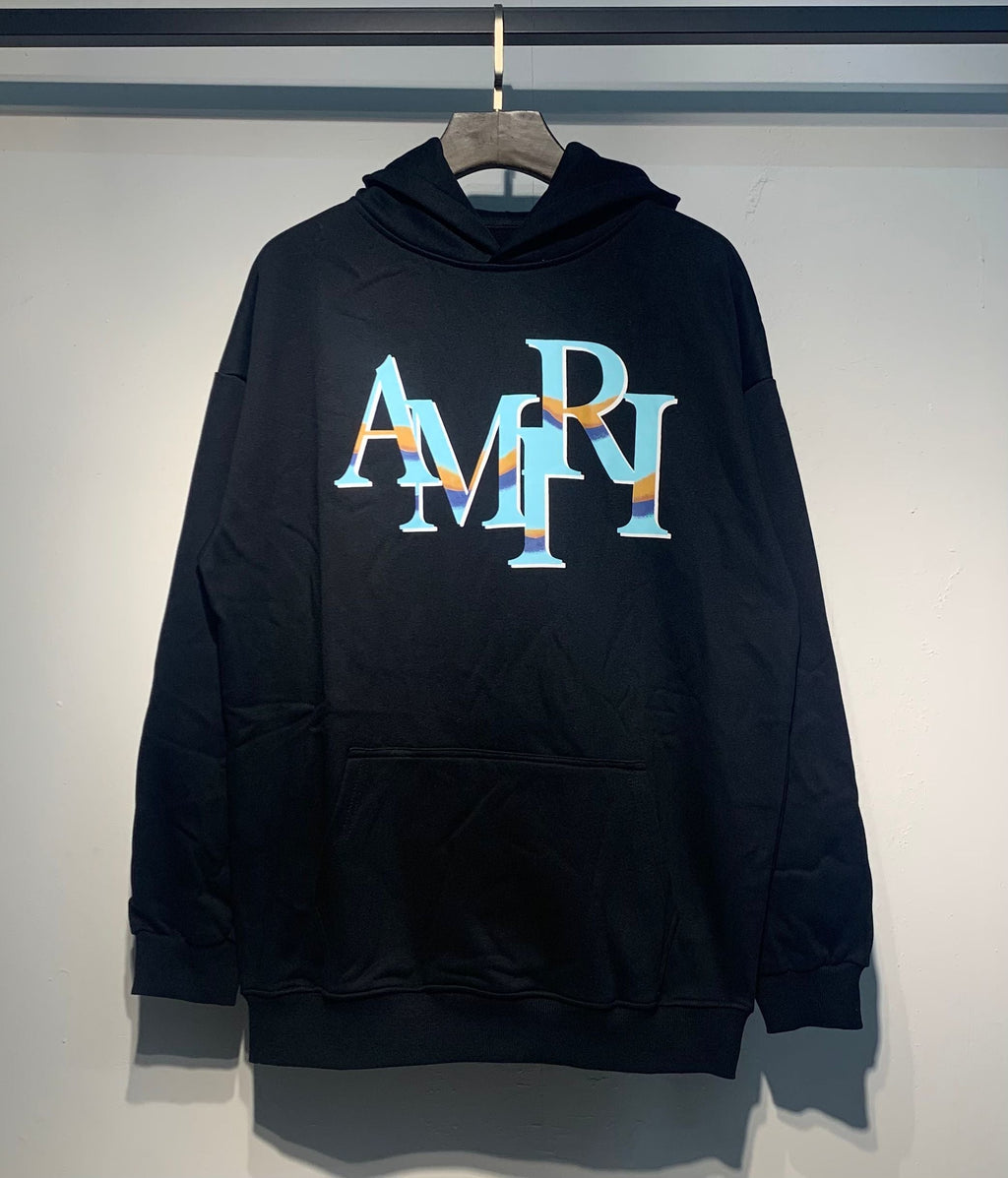 Amiri Staggered Iridescent Logo Hoodie – Black front view on hanger